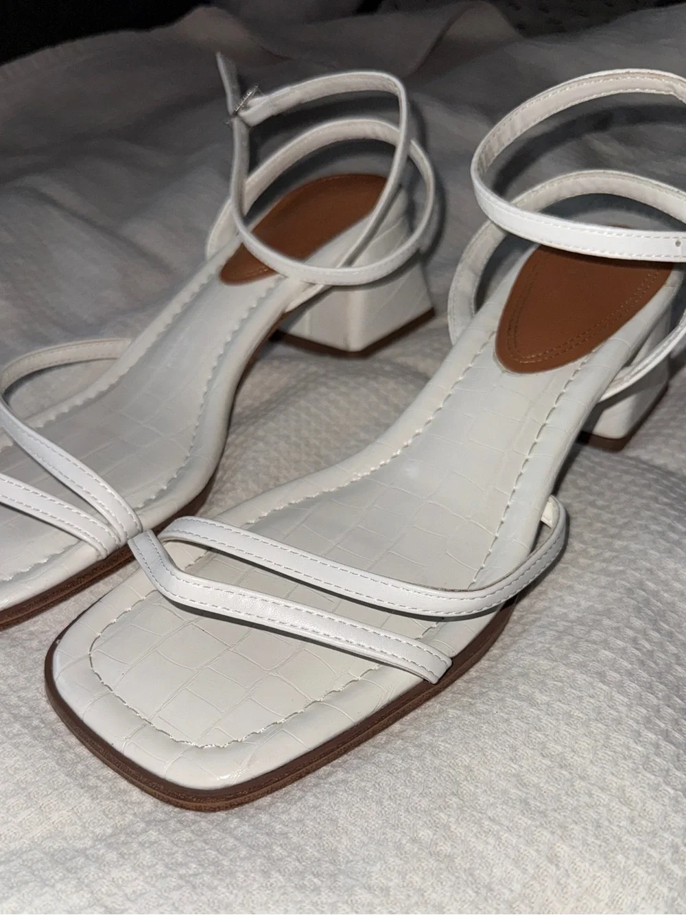 White strappy sandals